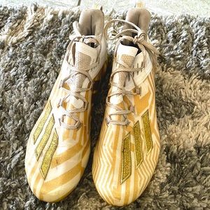 Gold Adidas cleats for football men’s